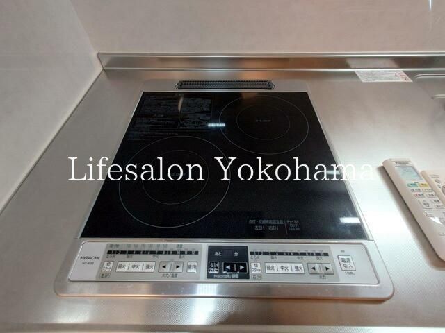 y̑ݔz@