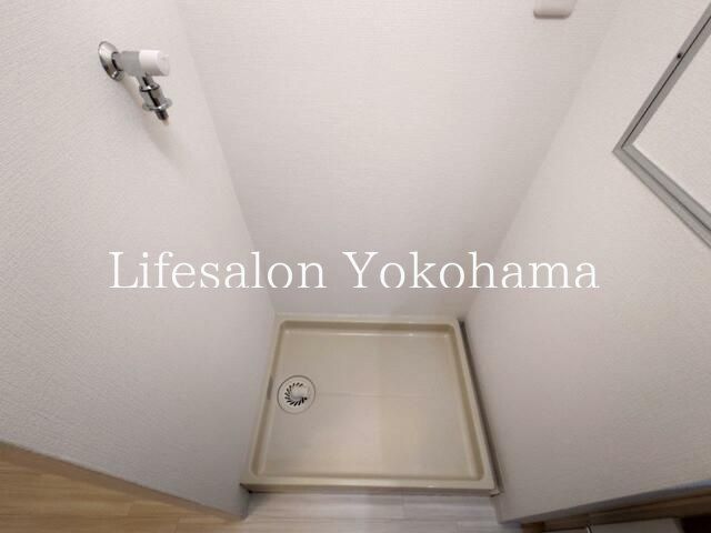 y̑ݔz@