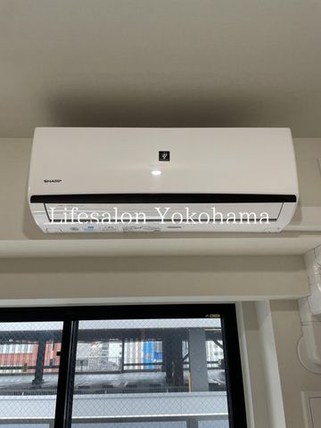 y̑ݔz@