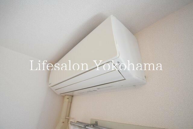 y̑ݔz@