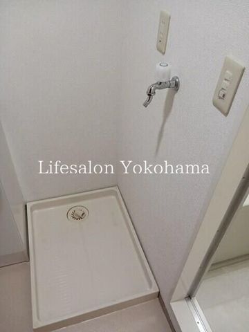 y̑ݔz@