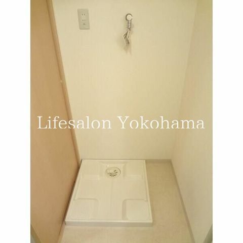 y̑ݔz@