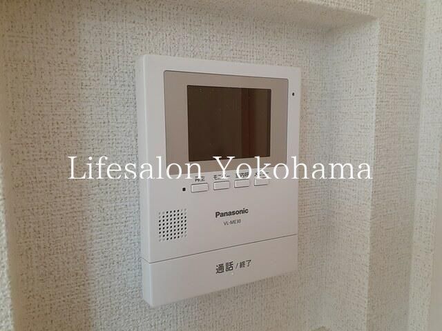 y̑ݔz@