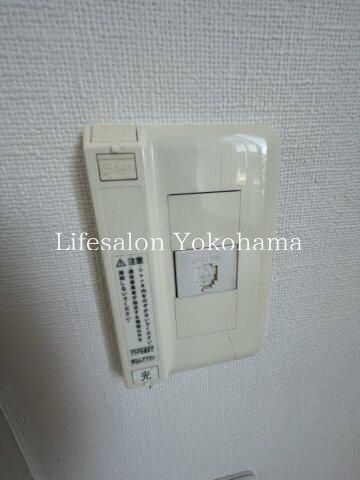 y̑ݔz@