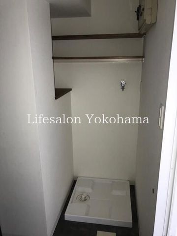 y̑ݔz@