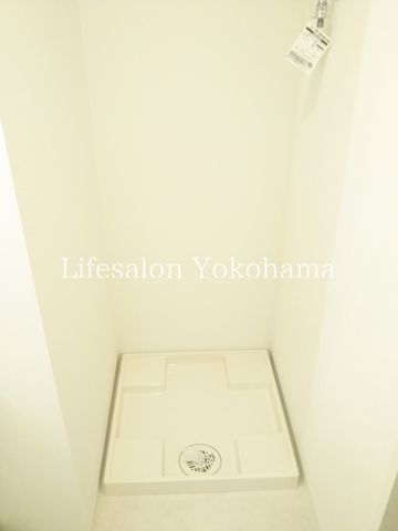 y̑ݔz@