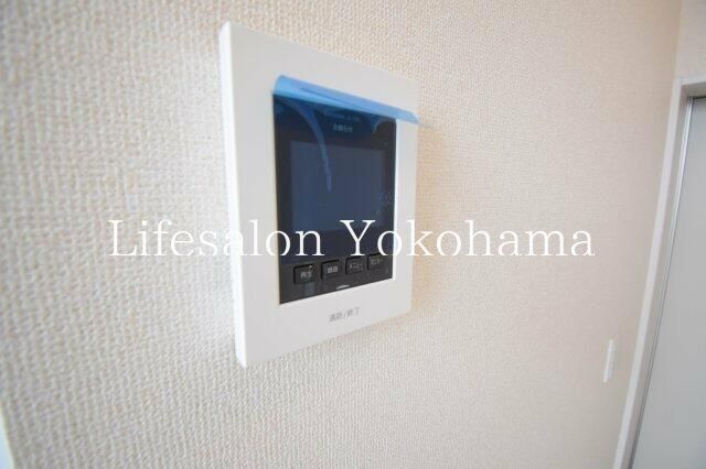 y̑ݔz@