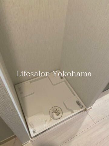 y̑ݔz@
