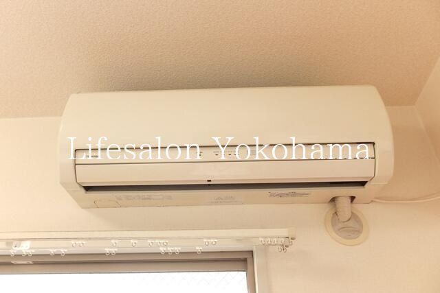 y̑ݔz@