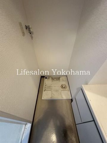 y̑ݔz@