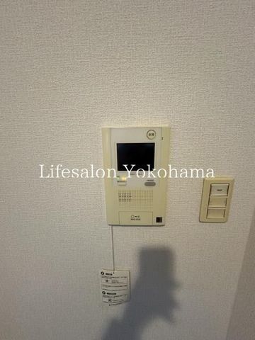 y̑ݔz@