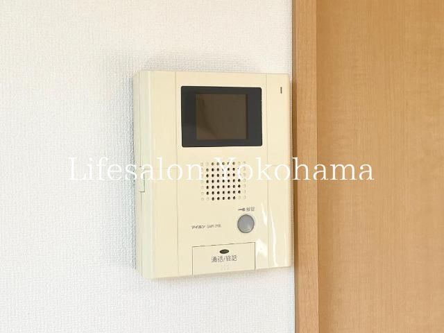 y̑ݔz@