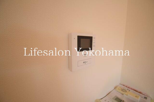 y̑ݔz@