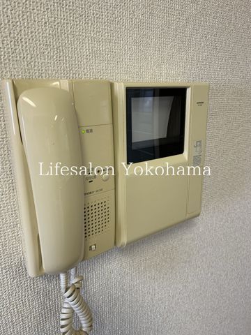 y̑ݔz@