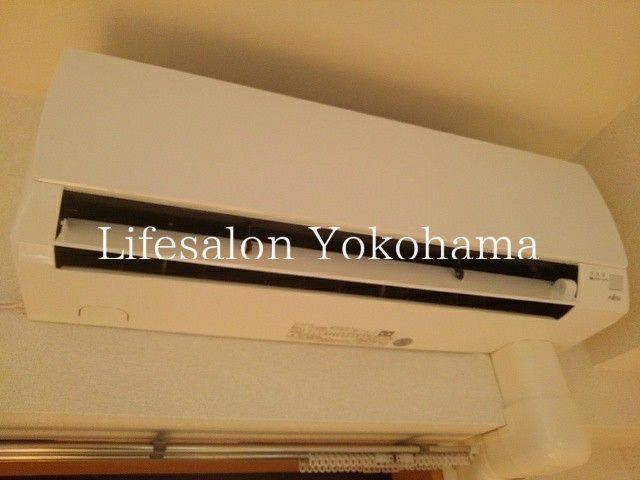 y̑ݔz@