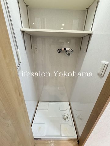 y̑ݔz@