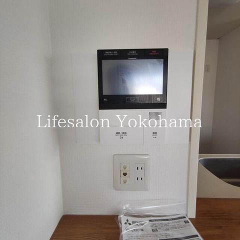 y̑ݔz@