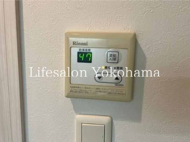 y̑ݔz@