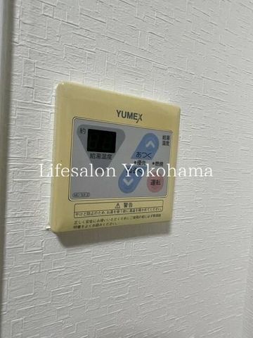 y̑ݔz@