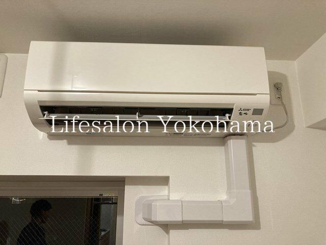 y̑ݔz@