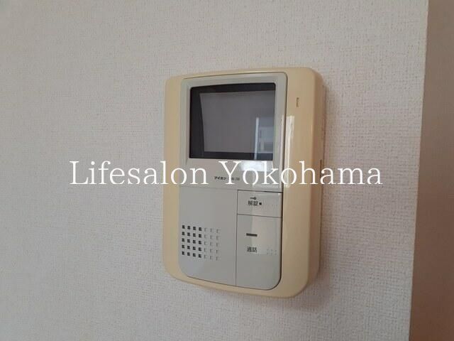 y̑ݔz@